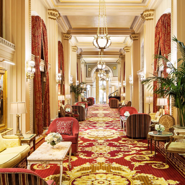 a long hallway with chairs and tables