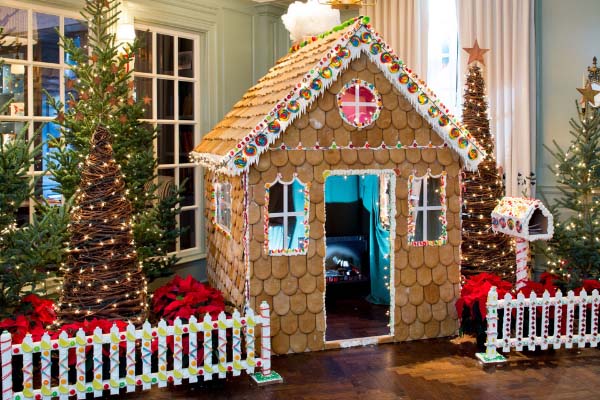 a gingerbread house in a room
