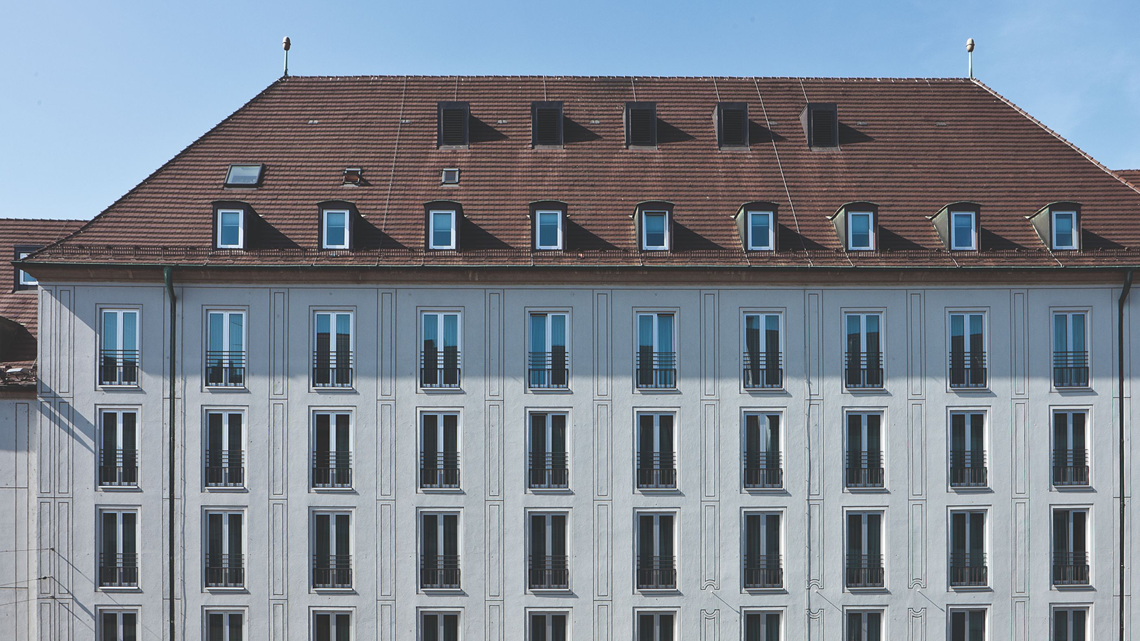 a building with many windows 23