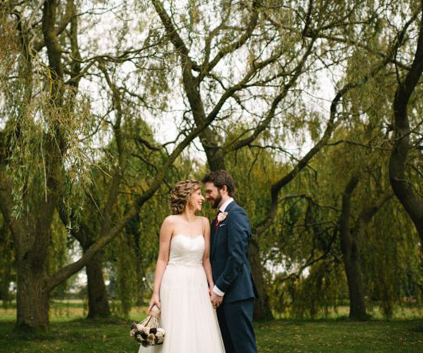 a man and woman in a wedding dress