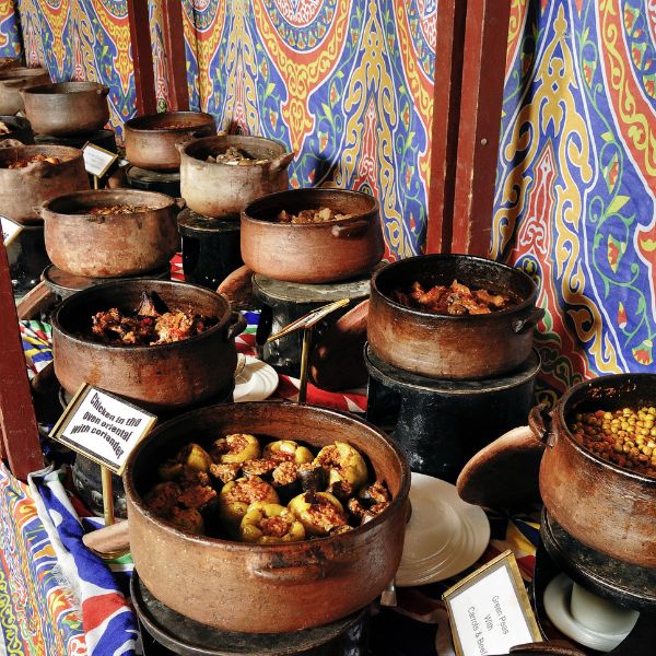 a group of pots of food