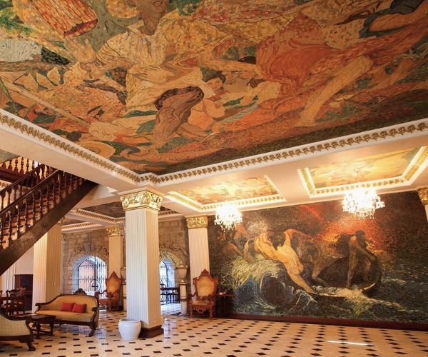 a room with a mosaic ceiling