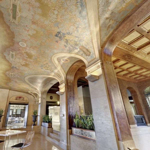 a hallway with art deco ceiling
