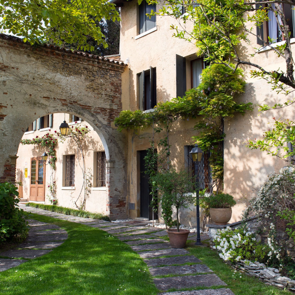 a stone walkway leading to a building