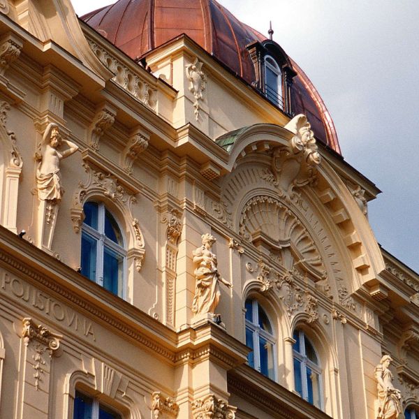 a building with statues on the side