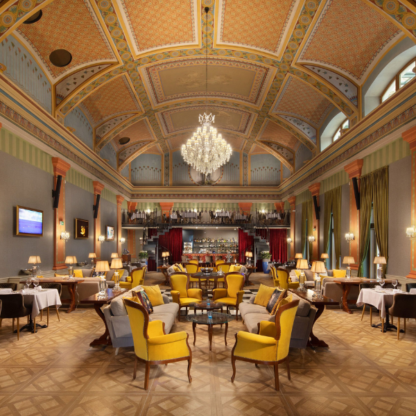a room with tables and chairs