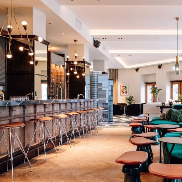 a bar with chairs and tables
