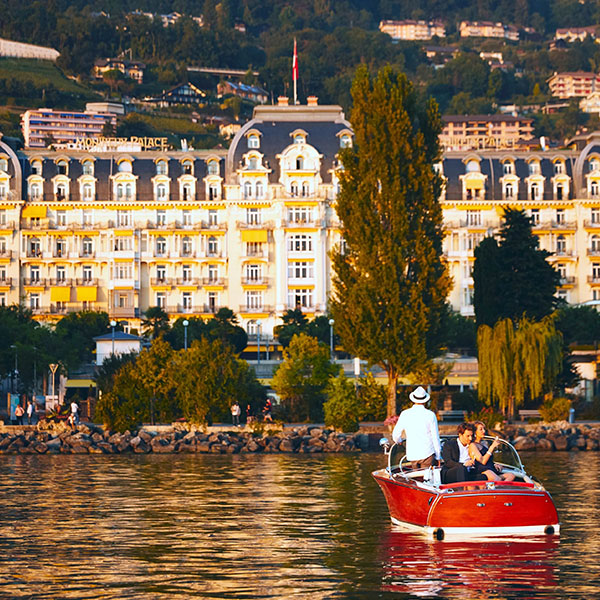 a group of people on a boat in a body of water