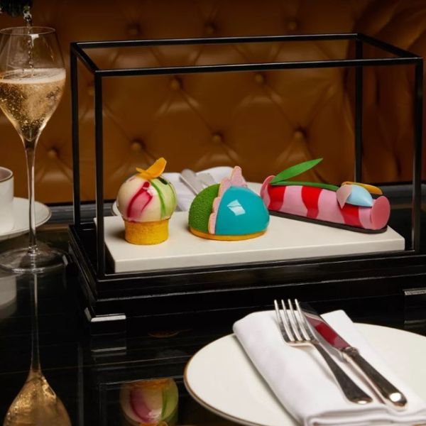 a glass case with food on it