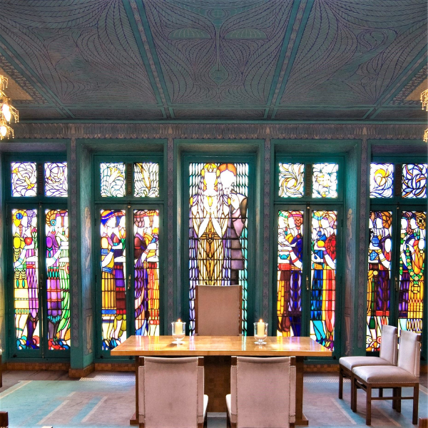 a room with a table and chairs