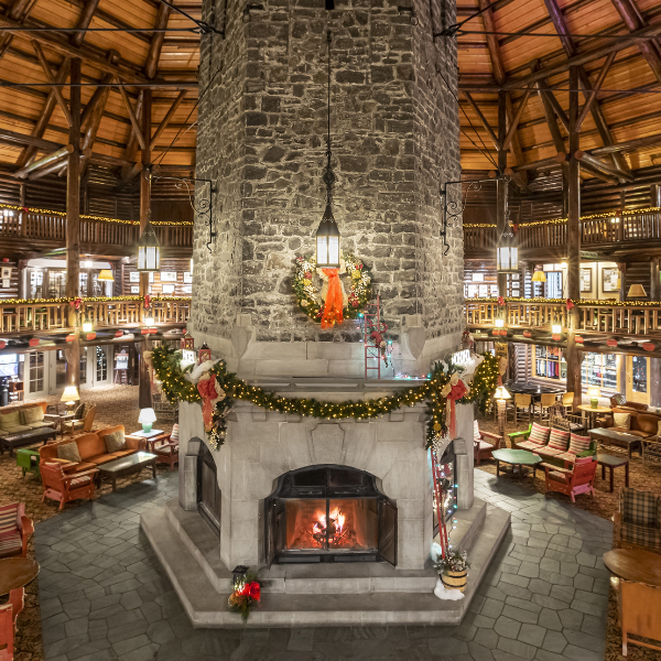 a large stone fireplace in a large room