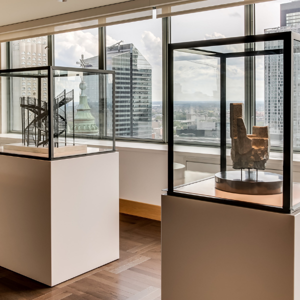 a display case with a statue in it