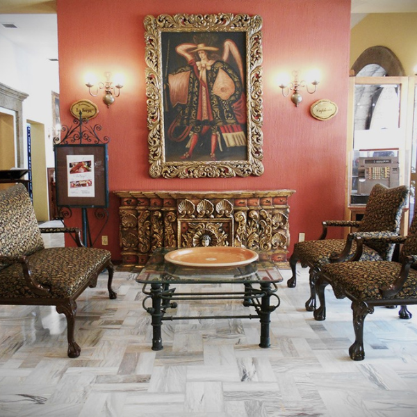 a room with chairs and a table