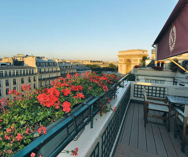 a balcony with flowers on it