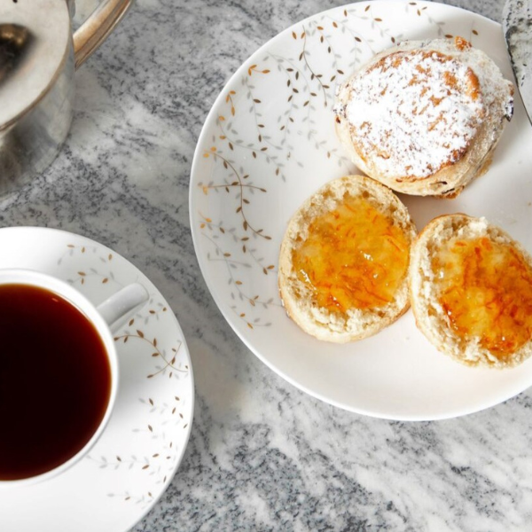 a plate of food and a cup of tea