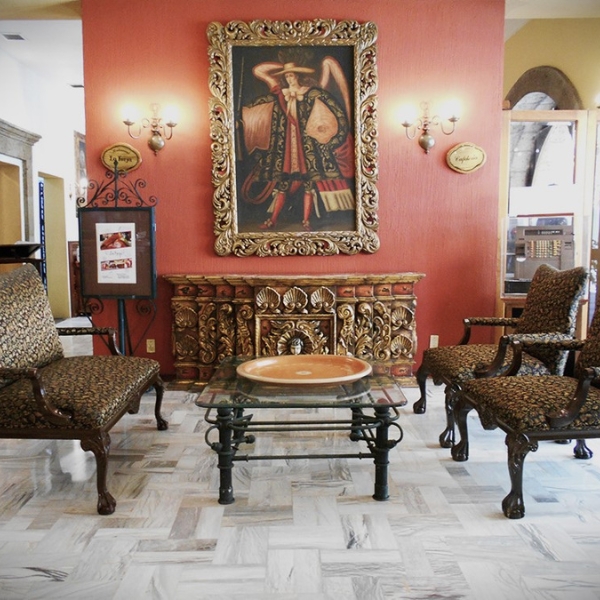 a room with a painting on the wall
