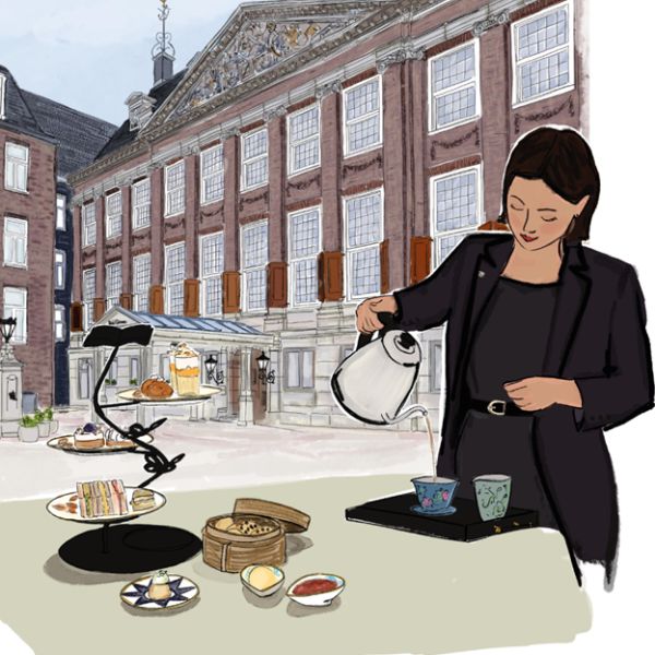 a woman pouring tea into a tray