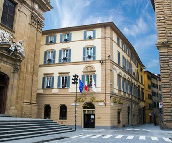 a building with flags on the side