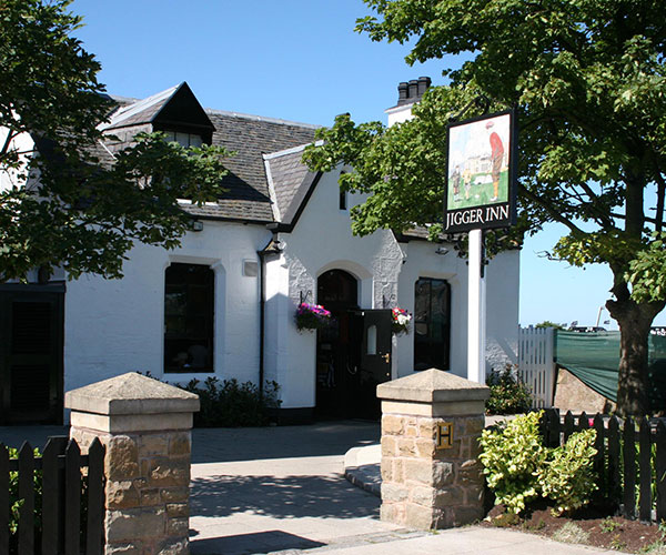 a white building with a sign