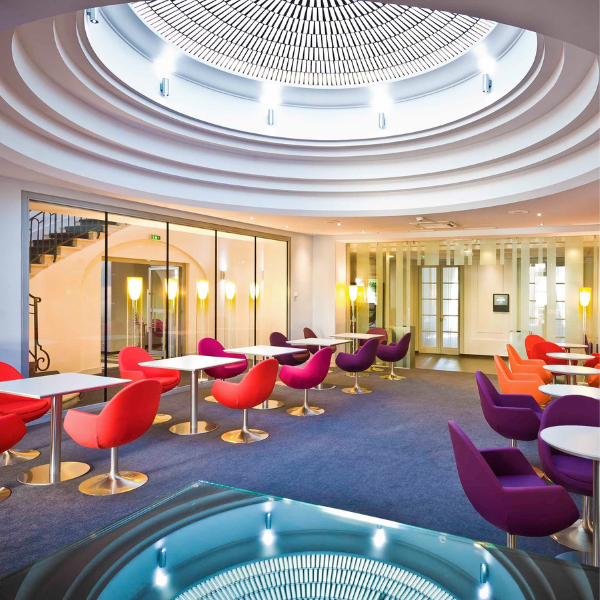 a room with tables and chairs