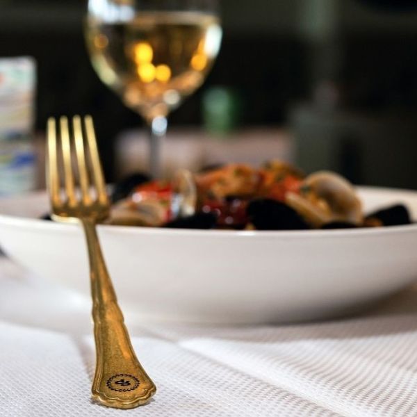 a fork in a bowl of food