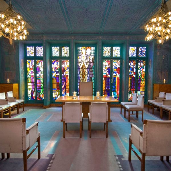 a room with a table and chairs