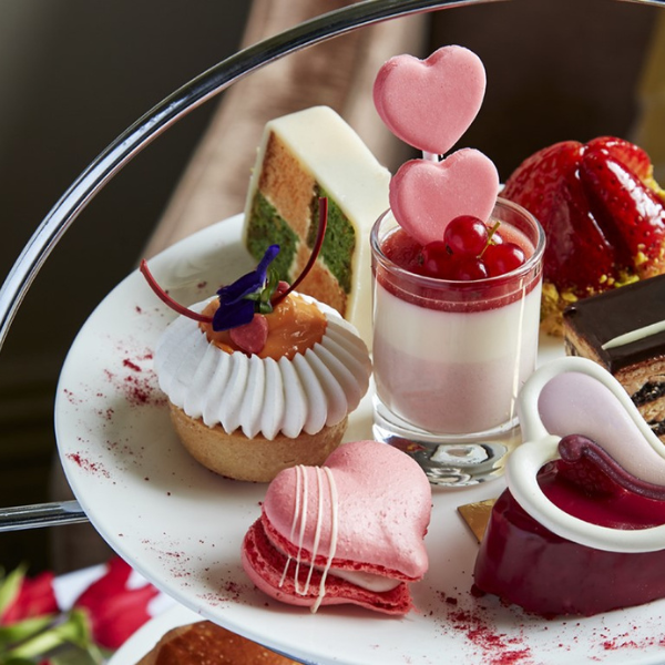 a plate of desserts and cupcakes