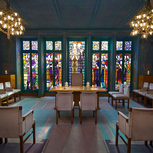 a room with a table and chairs