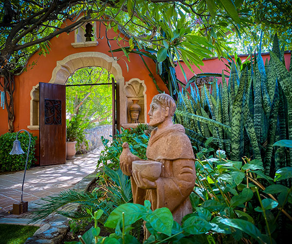 a statue in a garden