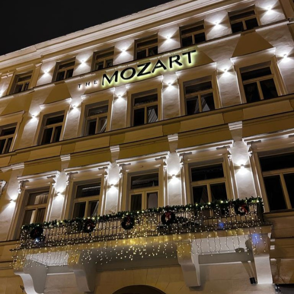 a building with lights on the front