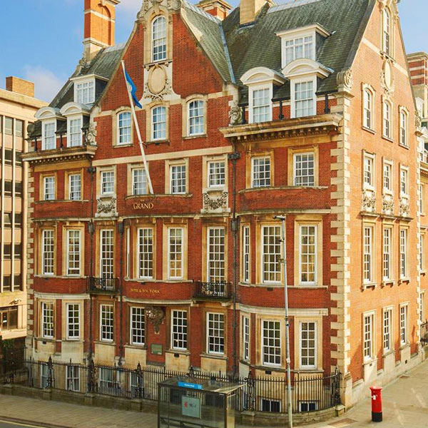 a building with a flag on the front