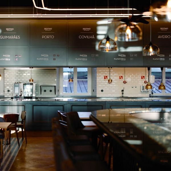 a room with a large counter and a large window