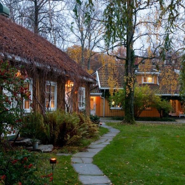 a house with a lawn and a path