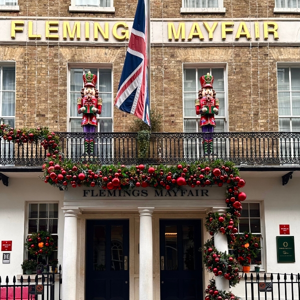 a building with a flag and decorations