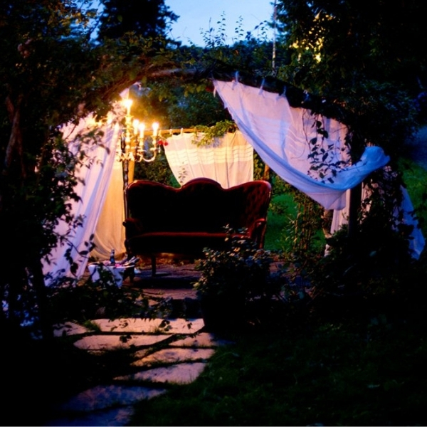 a couch under a canopy