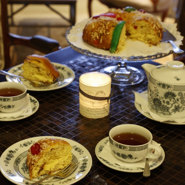 a table with plates of food and tea