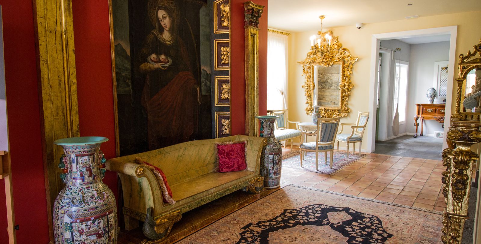 a room with a painting on the wall