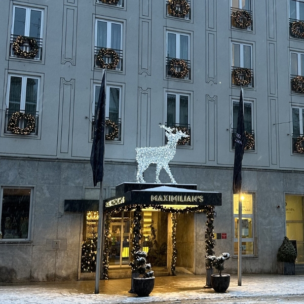 a building with a large building with a large deer statue