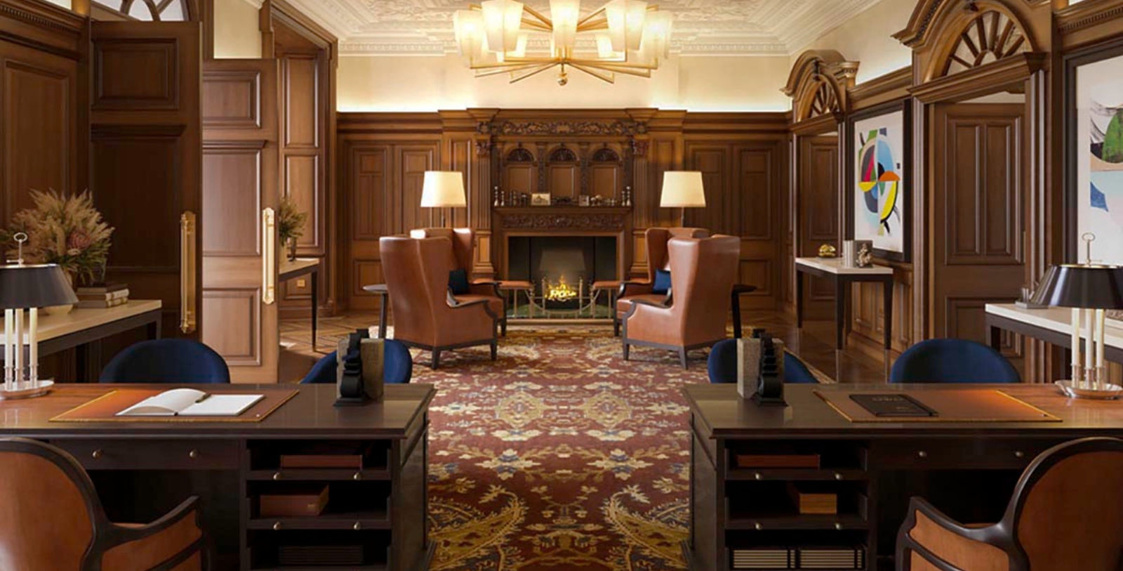 a room with a fireplace and chairs