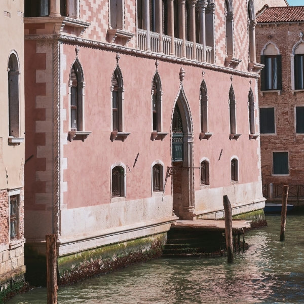 a building next to water