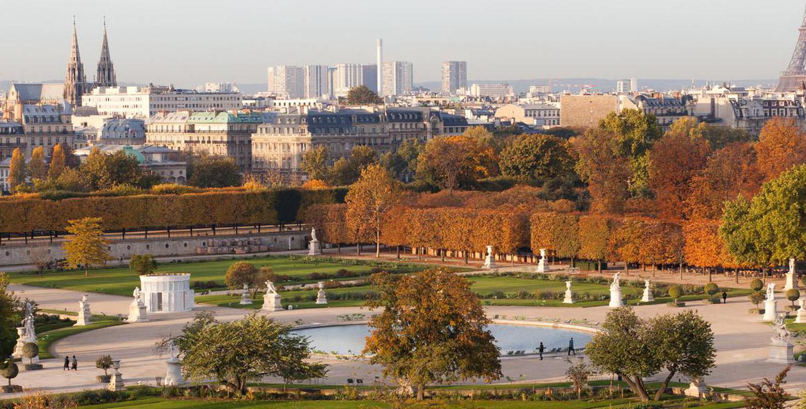 a park with trees and a fountain 7