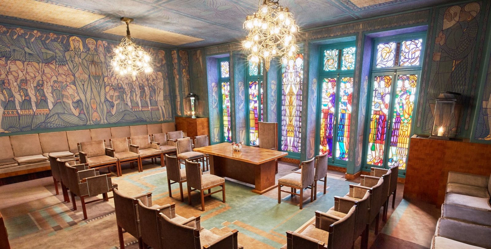 a room with a table and chairs