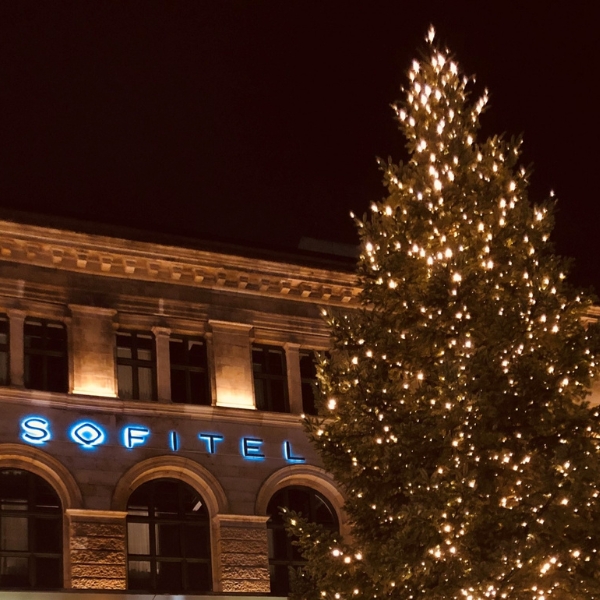 a building with a christmas tree