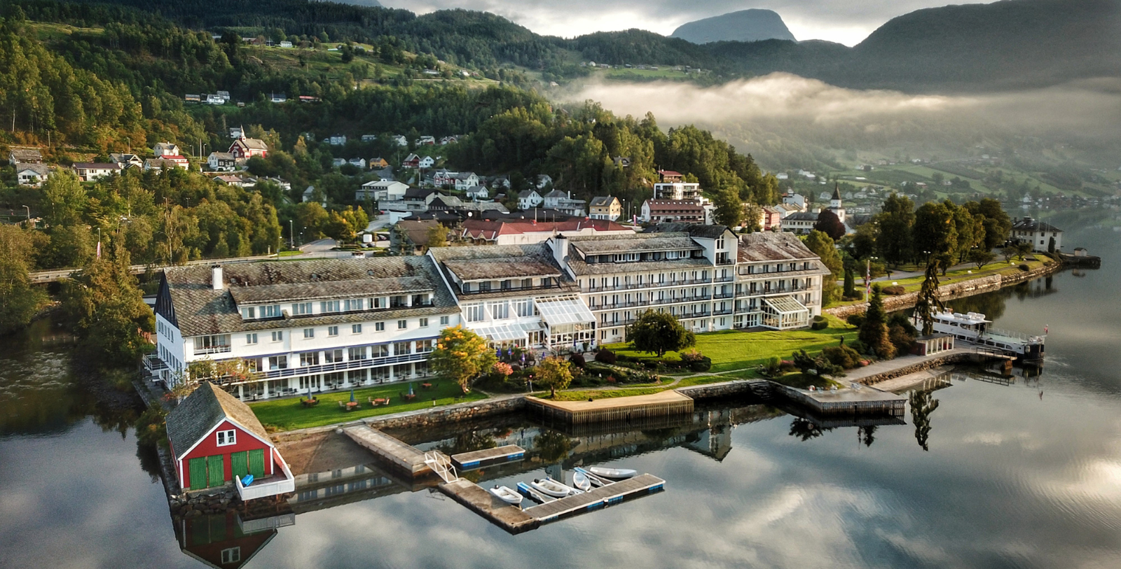 a building next to a body of water