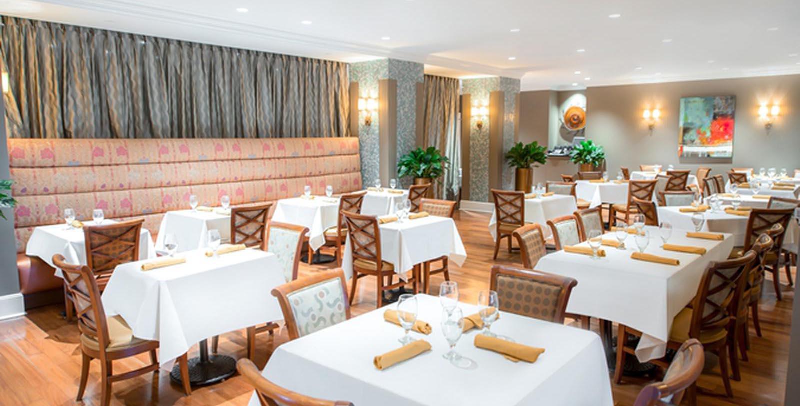a room with tables and chairs