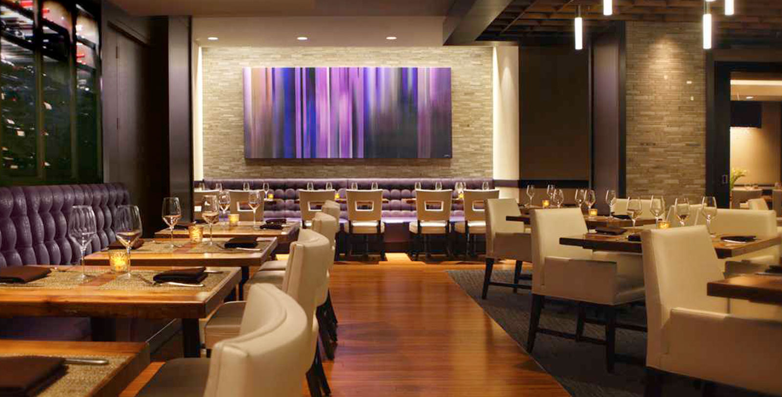 a restaurant with tables and chairs