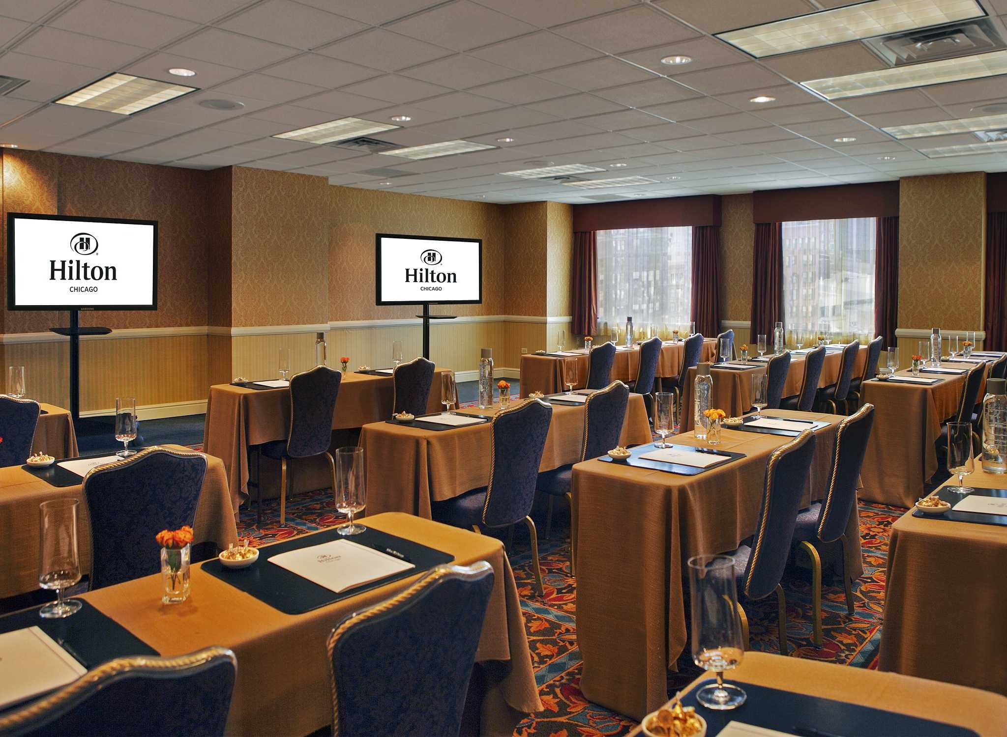 a room with tables and chairs