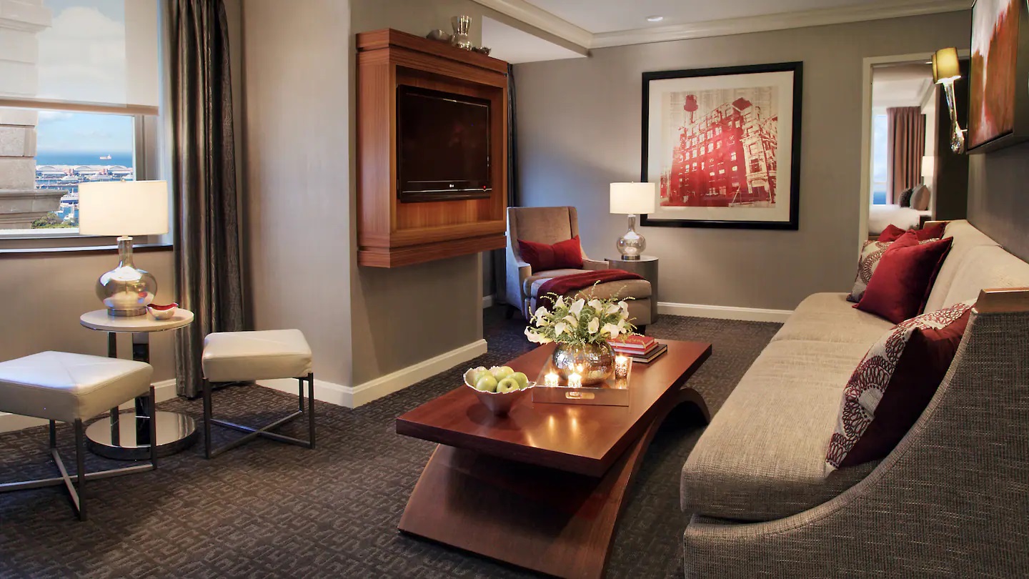 a living room with a television and a couch