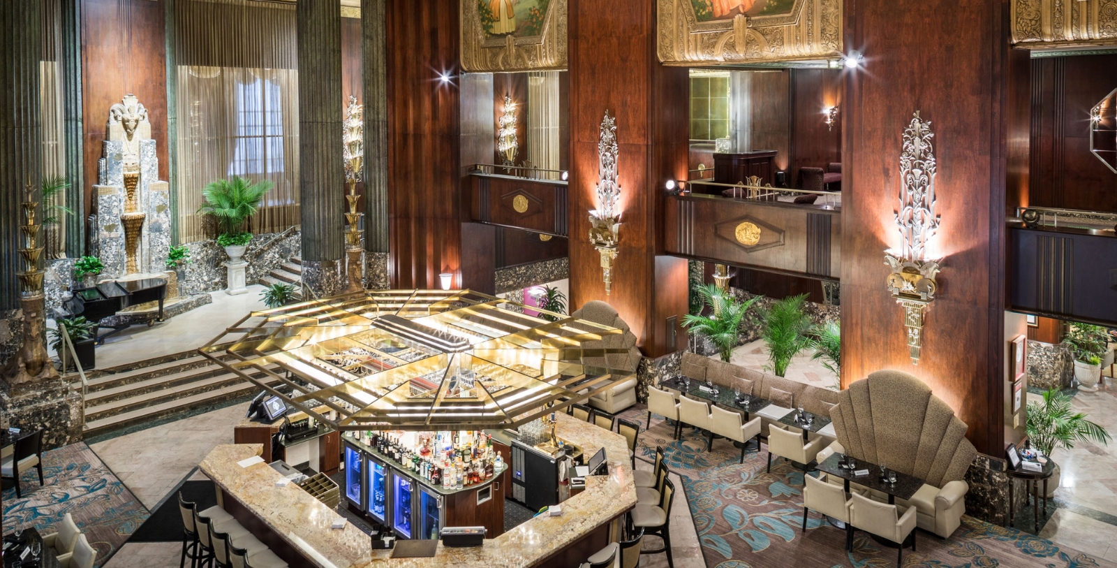 a large room with a bar and tables