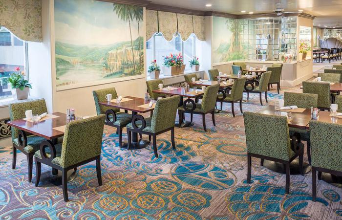 a room with tables and chairs
